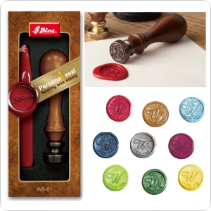 Sealing wax kit from Shiny. Includes wood handled engraved stamp, choice of 1 monogram letter (A - Z) seal and 1 stick red Waterstons sealing wax.